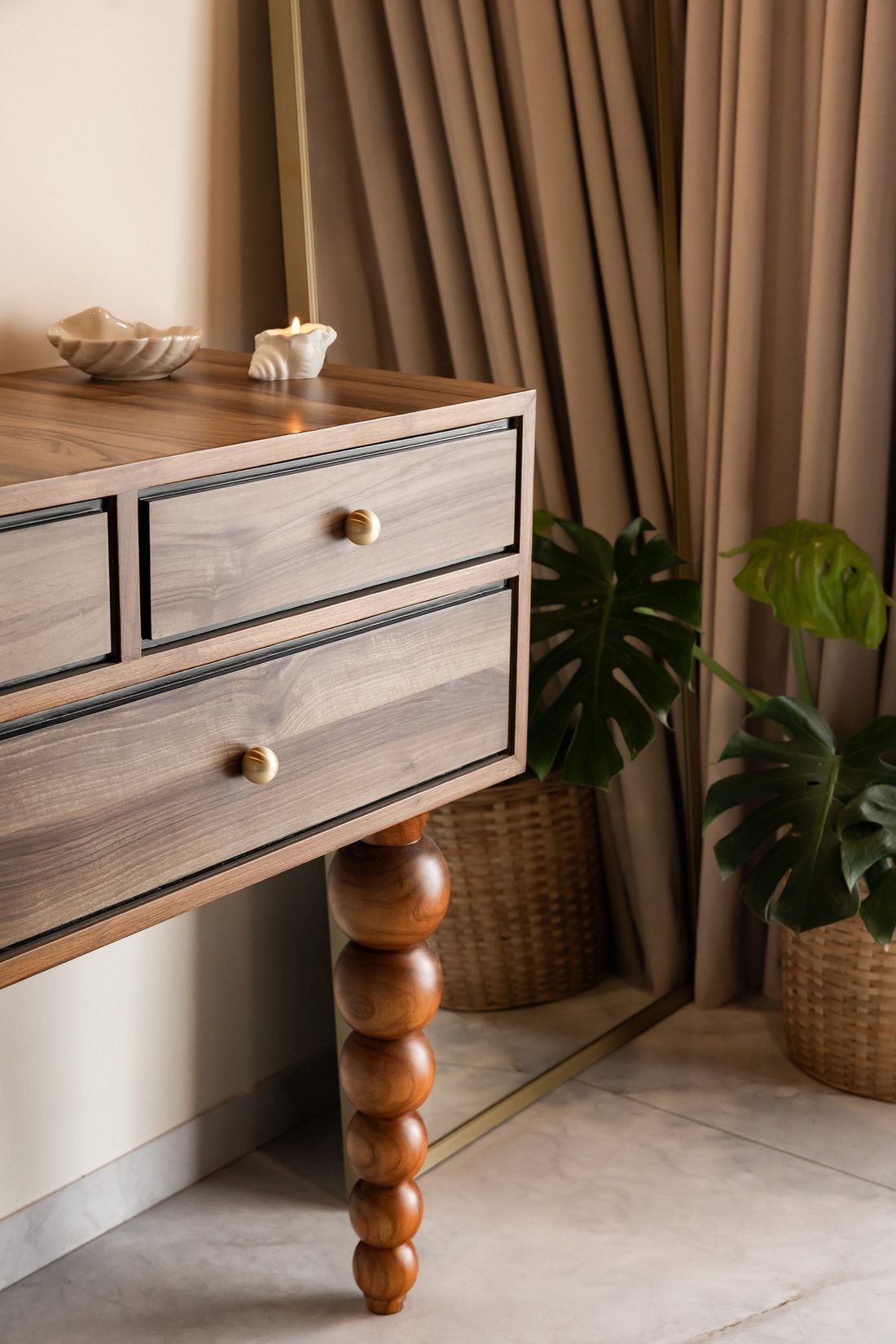 Detail of a wooden console with hand-turned spiral legs