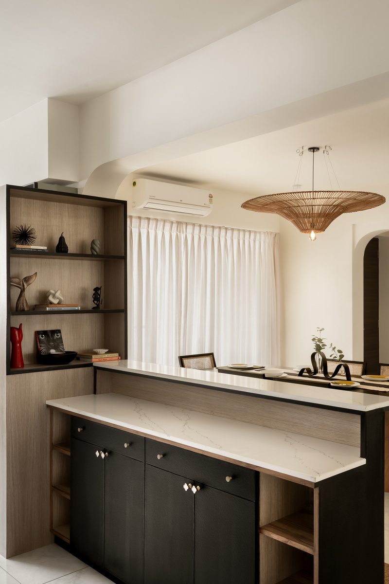 Dark fluted kitchen island with stone counter