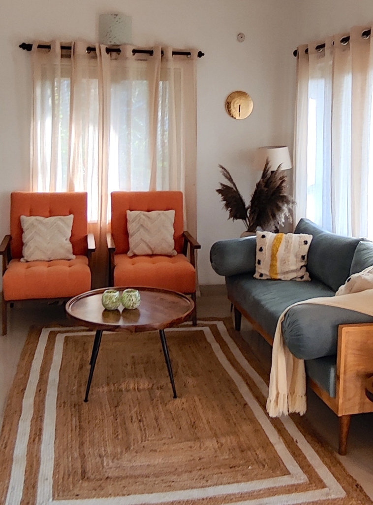 Boho tropical villa interior with cane and greenery