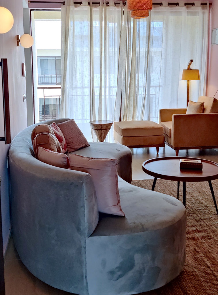 Dreamy bachelorette pad interior in calm neutral tones